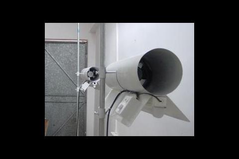 FIGURE 2: The fan-lamp and evaporator in the living room